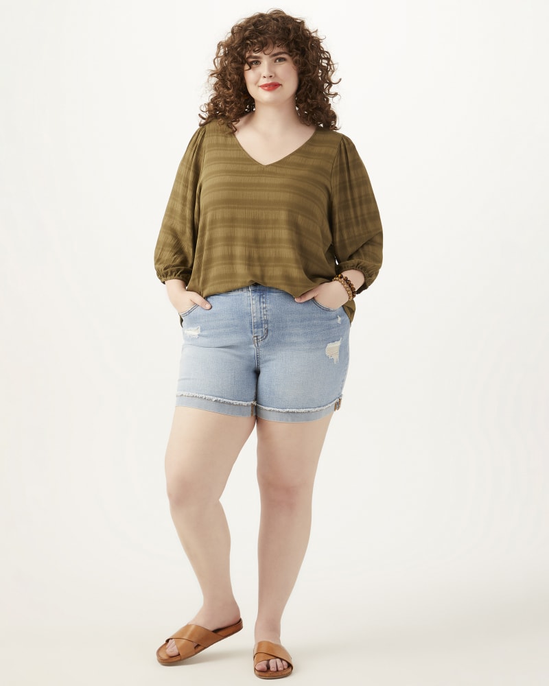 Front of 5'10" model wearing a plus size Regina Rolled Hem Short in Light Wash / Destructed Medium Wash by Molly & Isadora. | dia_product_style_image_id:274205